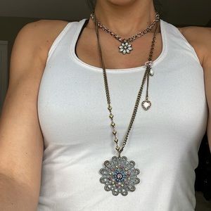 In new condition layered flower necklace by betsey johnson